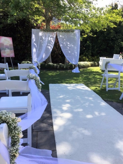 Fabric Curtained Arch $99.00 (Flowers not included)