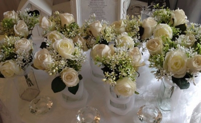 Flower jars for chairs $8.80 each