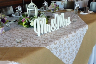 Rustic hessian and lace bridal table throw