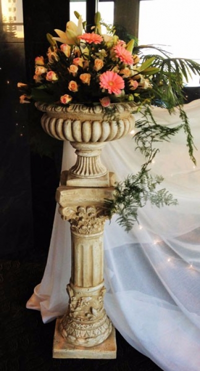 Urn, pedestal and flowers $99.00