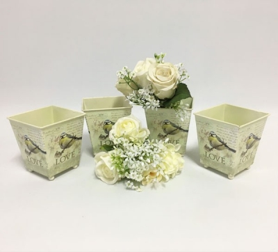 Square flower tins $4.40 each (not including flowers)