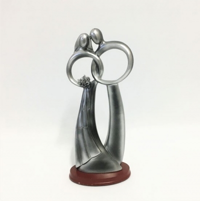 Silver bride and groom statuette $8.80 each