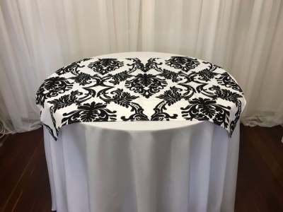 Black & white flocked damask small overlay $5.50 each