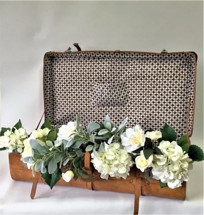 Vintage suitcase $25.00 Excluding flowers